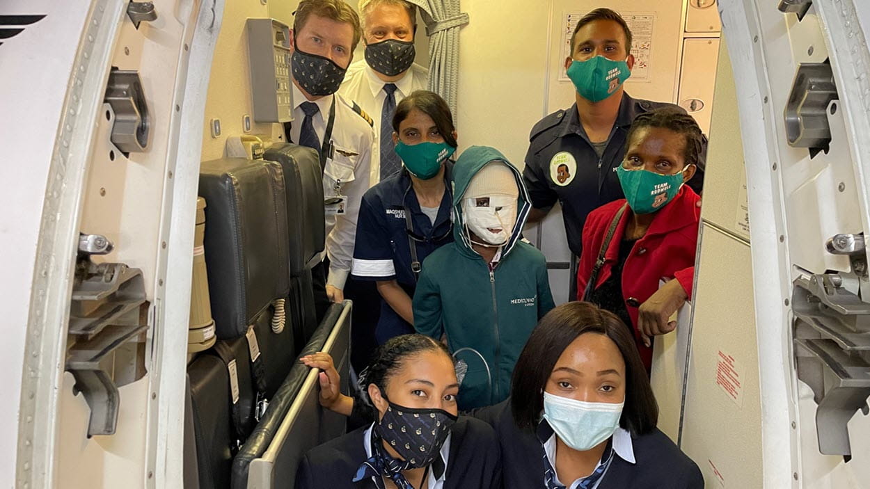 Medical team with Nine-year old Rodwell Nkomazana